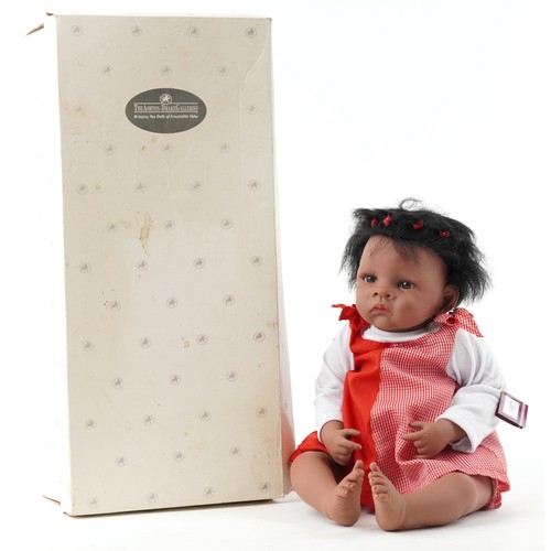 1162 - An Ashton-Drake Galleries 'Jasmine Goes to Grandmas' doll, circa 2004, 52cm in length, boxed.