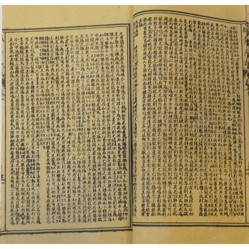 1114 - Twelve antique style paper books of Chinese script.