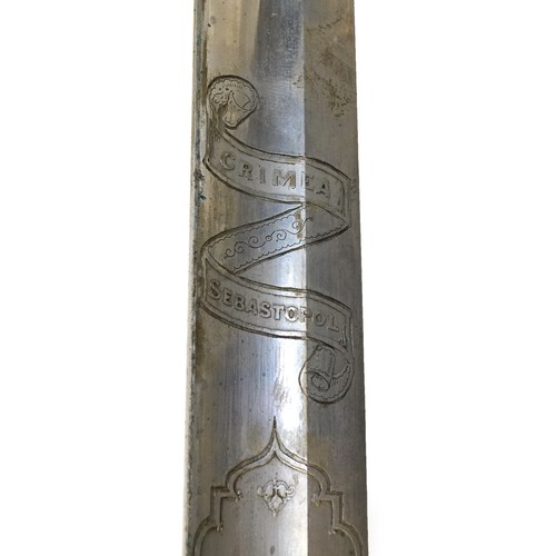 2508 - A British military Henry Wilkinson steel bladed sword with scabbard, 100cm in length.