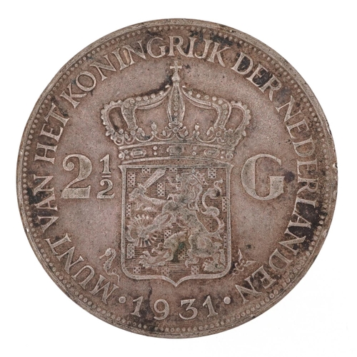 2202A - A Netherlands 1931 Queen Wilhelmina silver two and a half gulden, 38mm in diameter.