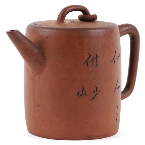 369 - A Chinese Yixing stoneware teapot, 20th century, decorated with script, bearing four character mark ... 