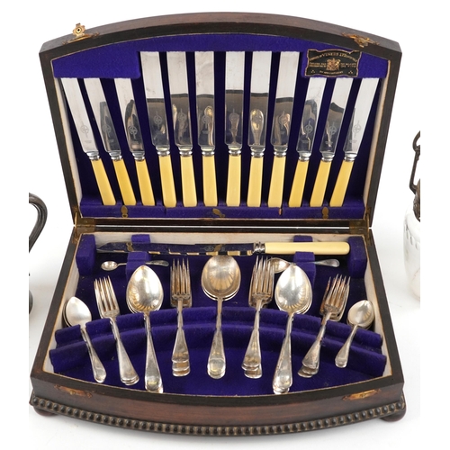 1608 - A George V plated canteen of cutlery by Viners Ltd., Sheffield within an oak case, 41cm wide, togeth... 