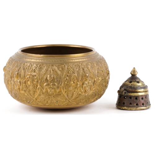 409 - An Indian gilt brass circular bowl, 20th century, profusely decorated with figures and scrolls, 24cm... 