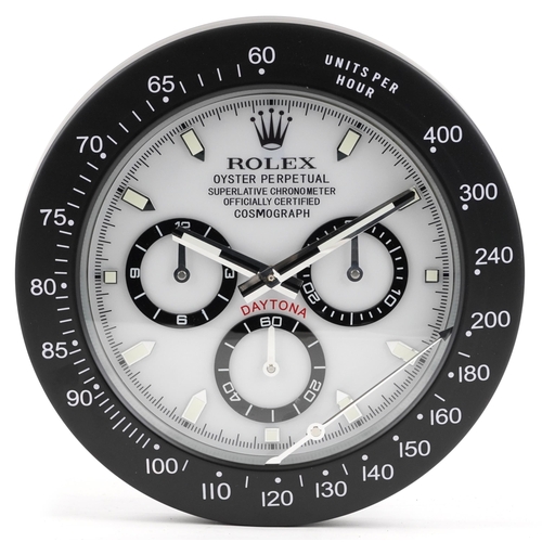 1634 - A Rolex Daytona design dealer's display wall clock, 34cm in diameter.