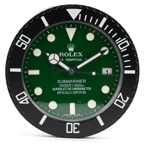 1555 - A Rolex Submariner design dealer's display wall clock, 34cm in diameter.