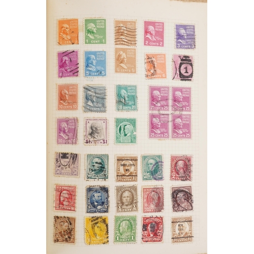 1329 - A red stamp album containing 19th century and later British and world stamps including China, France... 