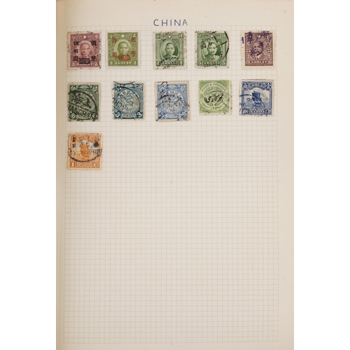 1329 - A red stamp album containing 19th century and later British and world stamps including China, France... 