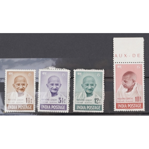 1328 - Four mint 1948 India 1st Anniversary of Independence, stamps of Mahatma Ghandi including the ten rup... 