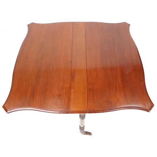 2129 - A Victorian mahogany drop flap Sutherland table raised on turned supports and down swept feet, 72cm ... 