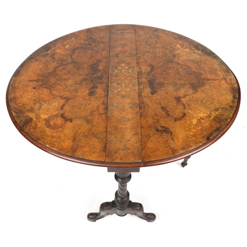 2127 - A mid Victorian burr walnut and boxwood inlaid oval drop flap Sutherland table raised on turned supp... 