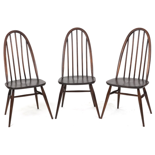 2125 - A set of three Ercol stained elm hoop back dining chairs, 43cm wide.