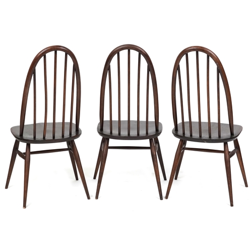 2125 - A set of three Ercol stained elm hoop back dining chairs, 43cm wide.