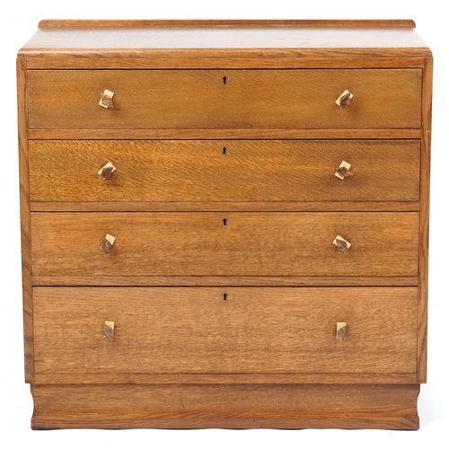  An Art Deco oak canteen chest of four long drawers with Bakelite handles containing a Rogers plated ... 