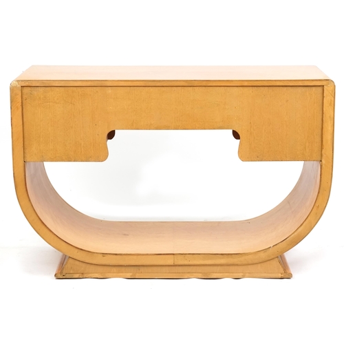  An Art Deco bird's eye maple and walnut console table of U shaped form fitted with five drawers with... 