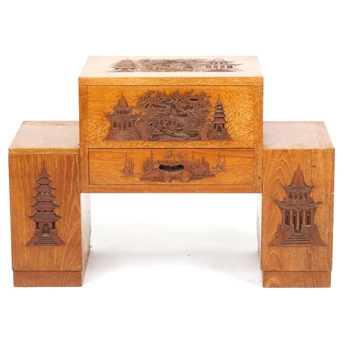  A Chinese teak side cabinet, early 20th century, with carved decoration, fitted with four drawers an... 