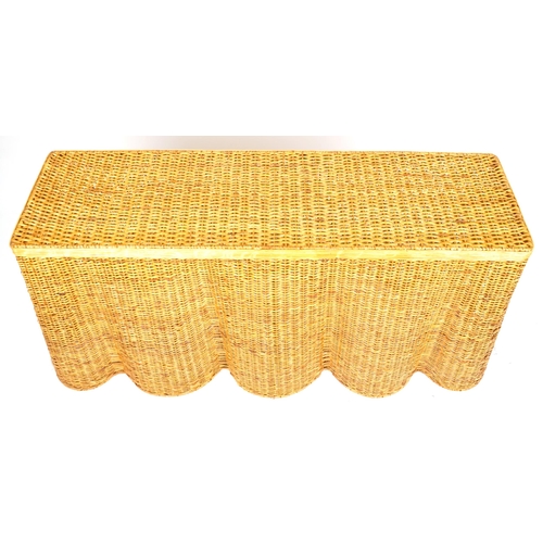  A contemporary Vivienne rattan scalloped console table retailed by Mrs. Alice.com, 79cm H x 167cm W ... 