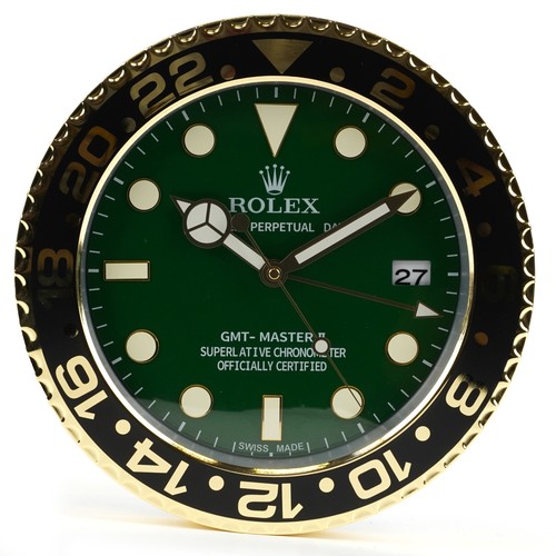 2585 - A Rolex GMT-Master 2 design dealer's display wall clock, 34cm in diameter.