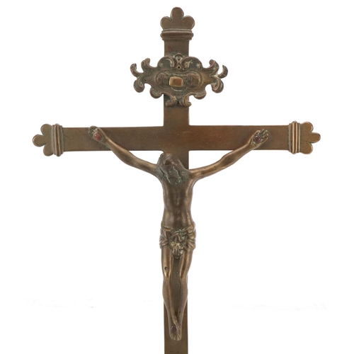 1650 - An 18th century Spanish brass crucifix circa 1762, bearing engraved script verso, 34cm x 18cm.