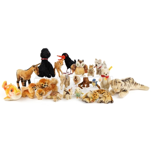 1135 - A good collection of twenty one mid 20th century Steiff stuffed mohair animal toys including dogs, b... 