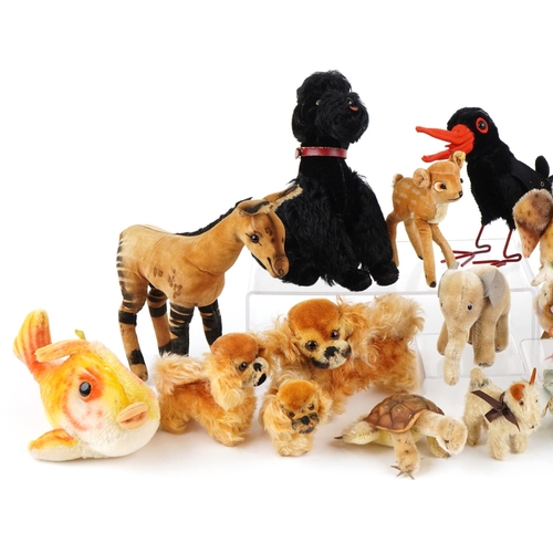 1135 - A good collection of twenty one mid 20th century Steiff stuffed mohair animal toys including dogs, b... 