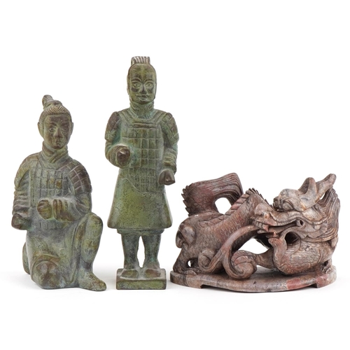 2552 - Two Chinese patinated bronze Terracotta Army figures and a carved stone study of a dragon, the large... 