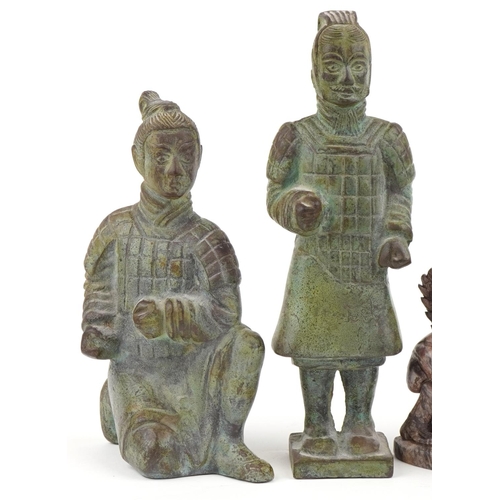 2552 - Two Chinese patinated bronze Terracotta Army figures and a carved stone study of a dragon, the large... 