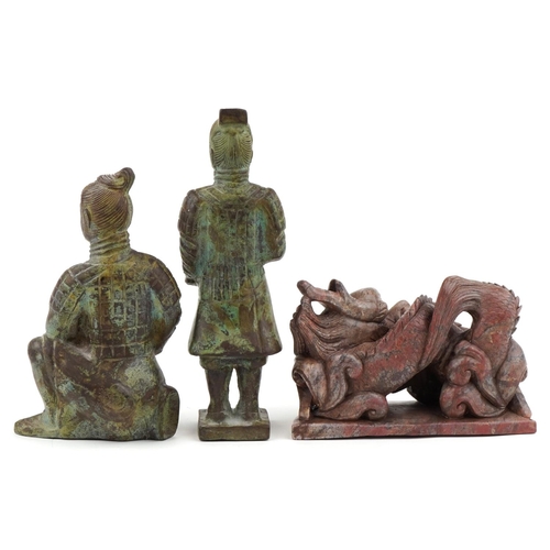 2552 - Two Chinese patinated bronze Terracotta Army figures and a carved stone study of a dragon, the large... 