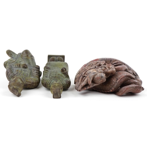 2552 - Two Chinese patinated bronze Terracotta Army figures and a carved stone study of a dragon, the large... 