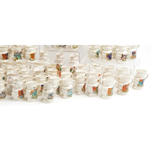 2520 - An extensive collection of crested china Toby jugs, approximately one hundred and eighty in total, i... 