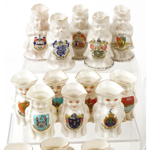  An extensive collection of crested china Toby jugs, approximately one hundred and eighty in total, i... 