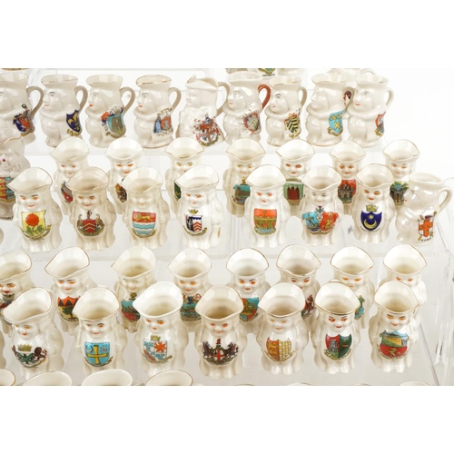 2520 - An extensive collection of crested china Toby jugs, approximately one hundred and eighty in total, i... 