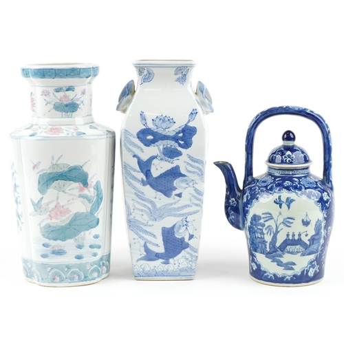 1585 - Two 20th century Chinese porcelain vases and a blue and white teapot decorated in the Willow Pattern... 