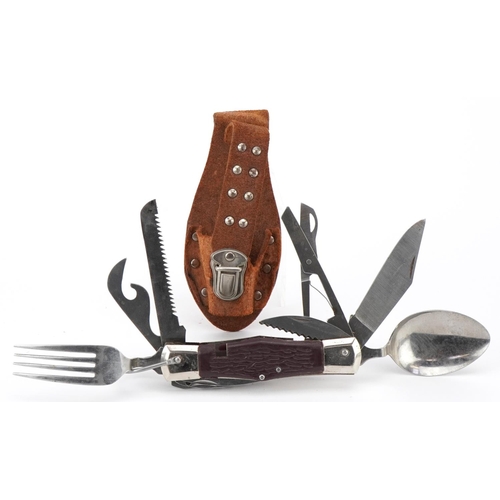 1621 - A Japanese stainless steel folding multi tool and utensils with leather case.