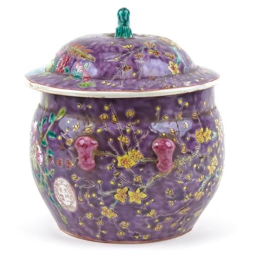 149 - A 20th century Chinese porcelain jar and cover hand painted with foliage onto a purple ground, four ... 