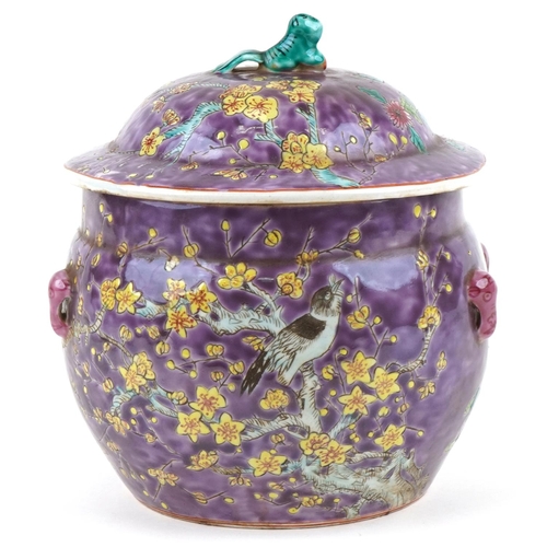 149 - A 20th century Chinese porcelain jar and cover hand painted with foliage onto a purple ground, four ... 