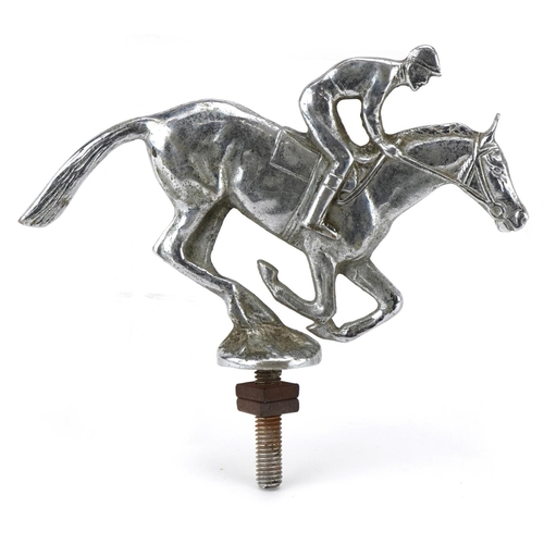 1387 - A vintage chrome plated car mascot in the form of a jockey on horseback, possibly Desmo, 17cm in len... 