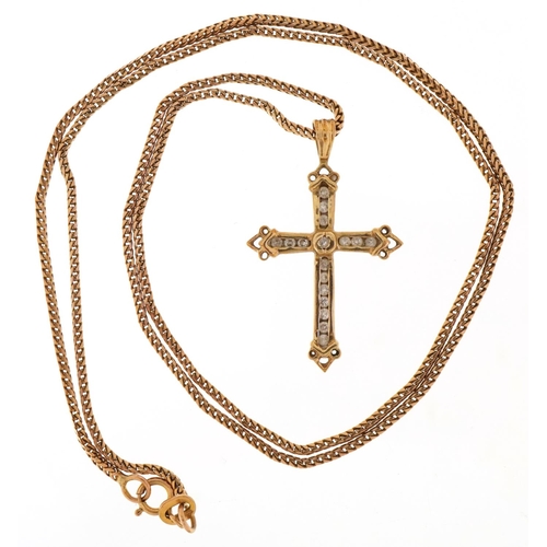 3056 - A 9ct gold Renaissance Revival diamond cross pendant on a 9ct gold herringbone necklace, 3cm high an... 