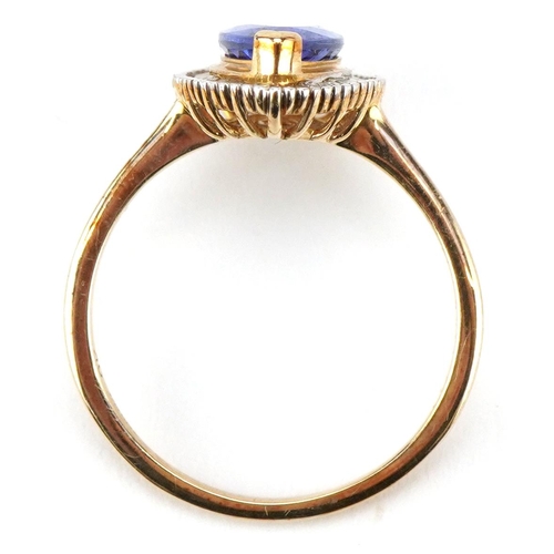 3084 - A 9ct gold marquis tanzanite and diamond ring, size O, 2.6g.