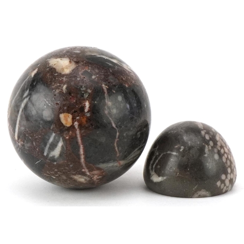 388 - A 20th century reconstituted marble ball, 9cm, together with another piece of polished marble, 6cm i... 