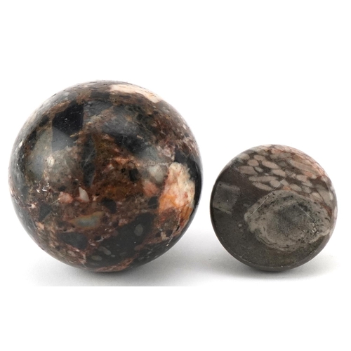 388 - A 20th century reconstituted marble ball, 9cm, together with another piece of polished marble, 6cm i... 