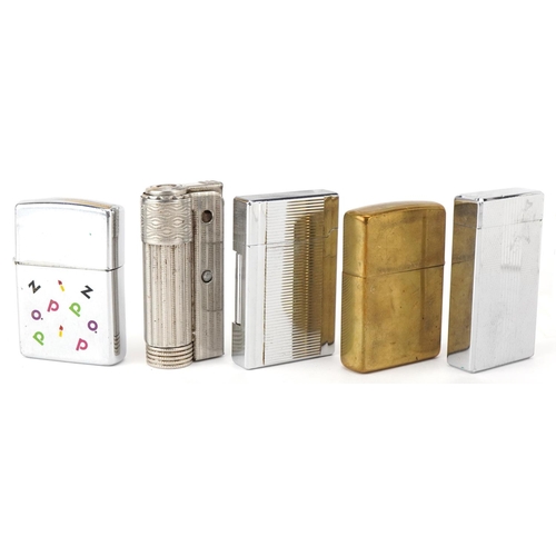 2623 - Eight vintage and later pocket lighters including a gold plated S T Dupont, Zippo and Calibre.