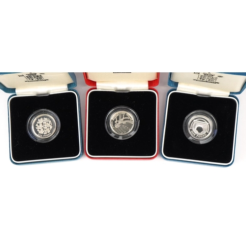 1317 - Seven boxed British silver proof coins some with certificates of authenticity to include End of Worl... 