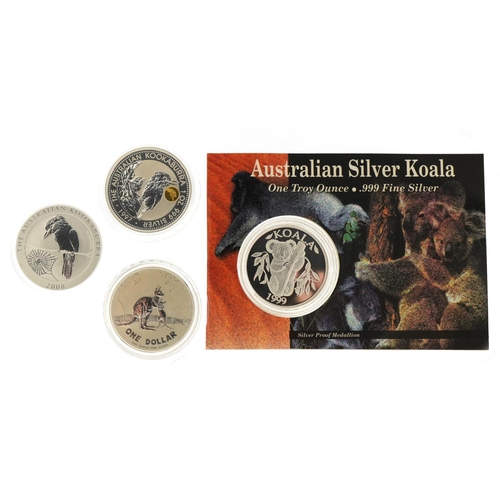 1285 - Four Australian one ounce fine silver one dollar coins and a medallion including 1997 one dollar Koo... 