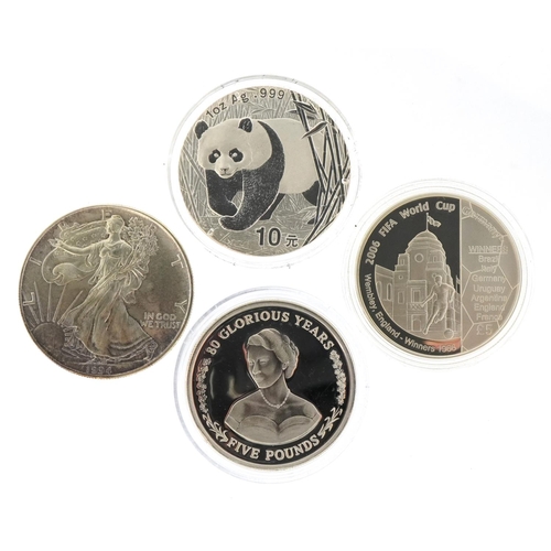 1290 - Two one ounce fine silver coins to include a 2002 Chinese Panda ten yuan, a 1994 USA one ounce fine ... 