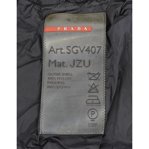 1022A - A gentleman's Prada Tg48 coat.