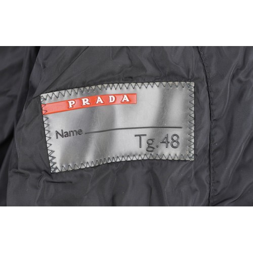 1022A - A gentleman's Prada Tg48 coat.