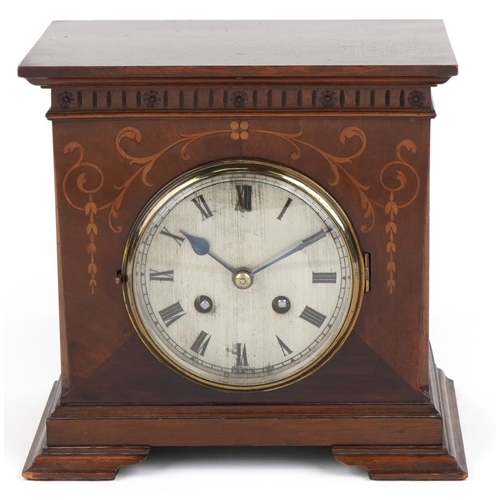 200 - A late Victorian mahogany cased mantle clock with inlaid decoration, the circular silvered dial with... 