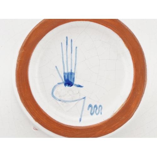 367 - A mid 20th century Swedish studio pottery dish by Stig Lindberg, 1916-1982, signed to base, 18cm in ... 