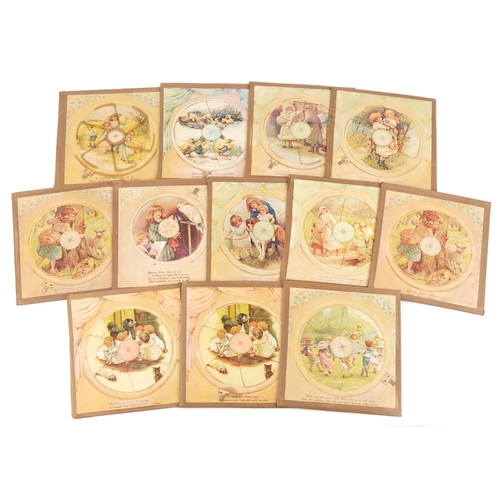 1431 - A collection of twelve early 20th century children's revolving story boards, variously themed, each ... 