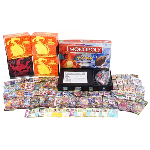 1149 - A large collection of Pokémon trade cards and a Monopoly board game, including Paradox Rift, Astral ... 